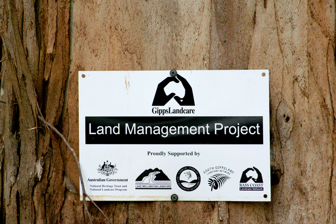 Land Management Project sign showing sponsors.