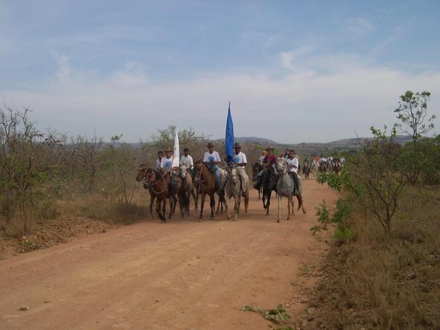 The troop carring a flag to Nossa Senhora da Aparecida party