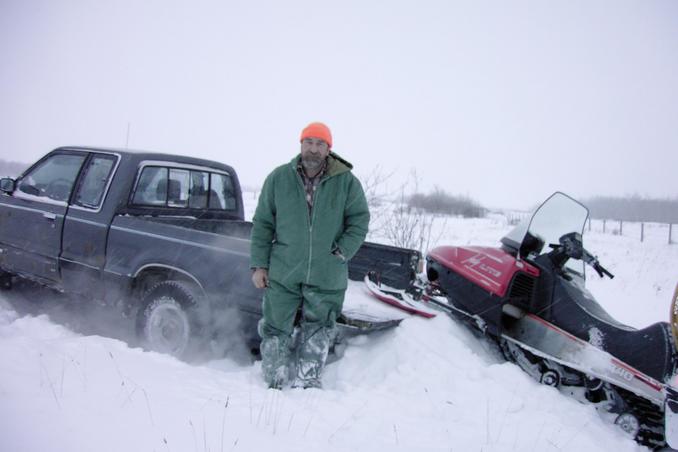 Gerhard V.  back at the truck loading snowmobile