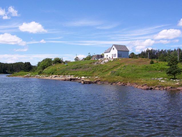 The guest house and waterfront, as seen from the dock