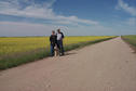 #5: Carolyn, Max and Alan in front of a canola (aka rape) field.