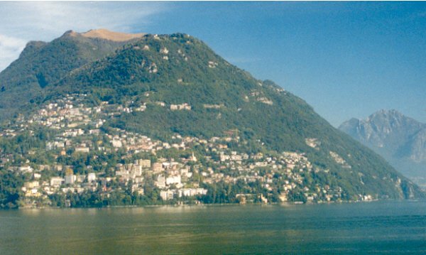 Looking northwest across Lake Lugano, the city of Lugano lies adjacent to the confluence.