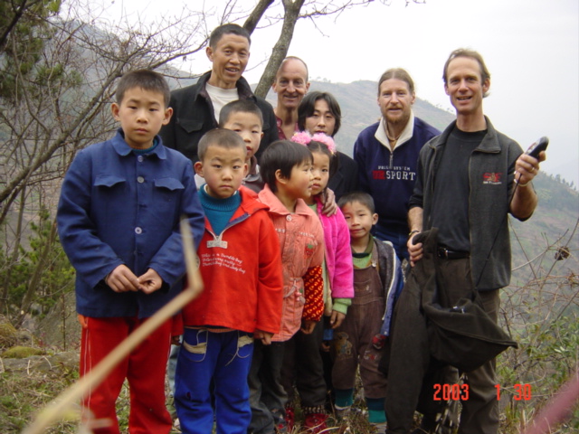 Group photo at the Confluence of residents and Richard Jones (left rear), Targ Parsons (center rear) and Peter Cao (right)