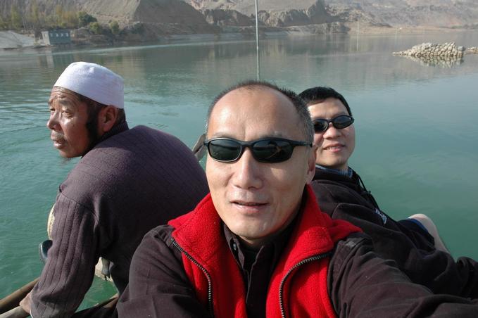 Mr. Hong and two happy line hunters at the confluence point