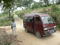 #8: Ah Feng and our minivan, at the intersection with the small gravel road we should have gone down