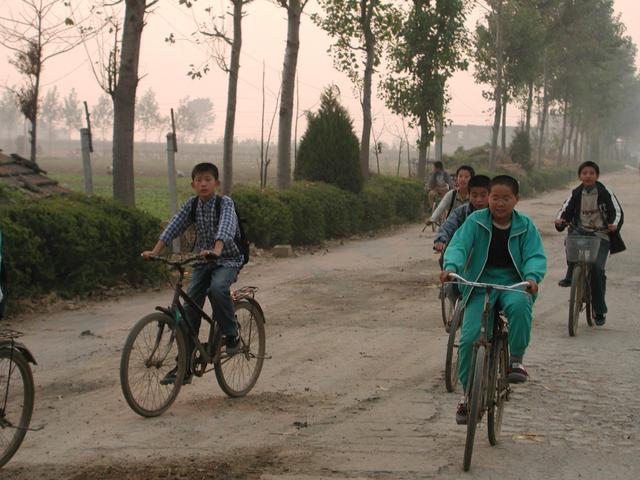 School children going home - the road 200 meters from the CP