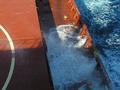 #8: More breakers splashing on the ship's main deck