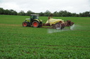 #2: A tractor spraying chemical right on the confleunce point