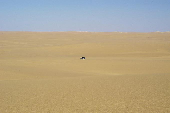 View of the confluence area. Due to only sand dunes and harsh daylight, I took the scene with one car