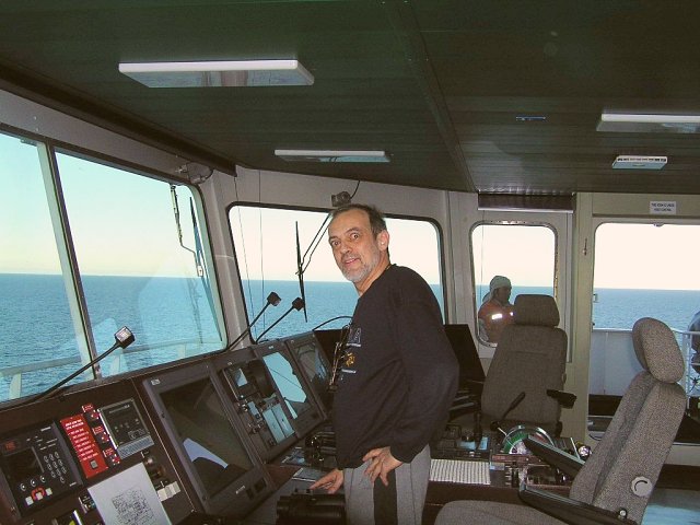 Captain Peter on the navigating bridge of the "Cabo Prior"