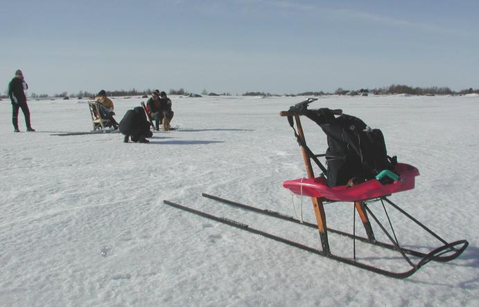 Kick sled with GPS device at confluence.