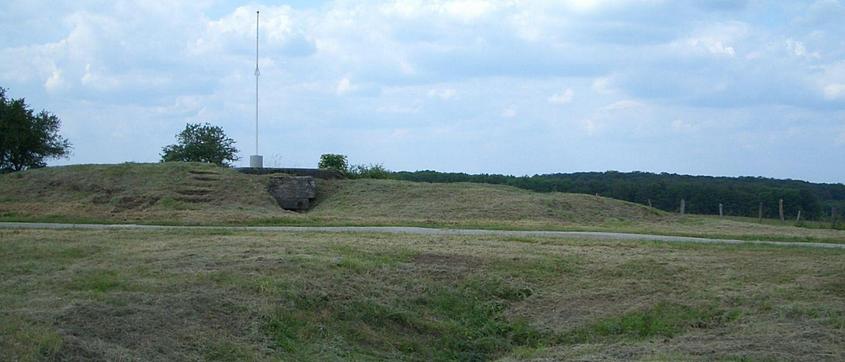 A bunker with area pocked by shells