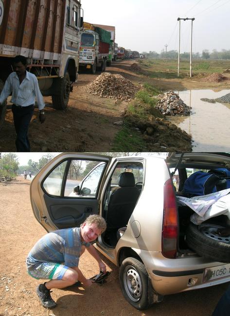 Trucks lined up to pass river Subamarekha into Orissa – Michael with the puncture