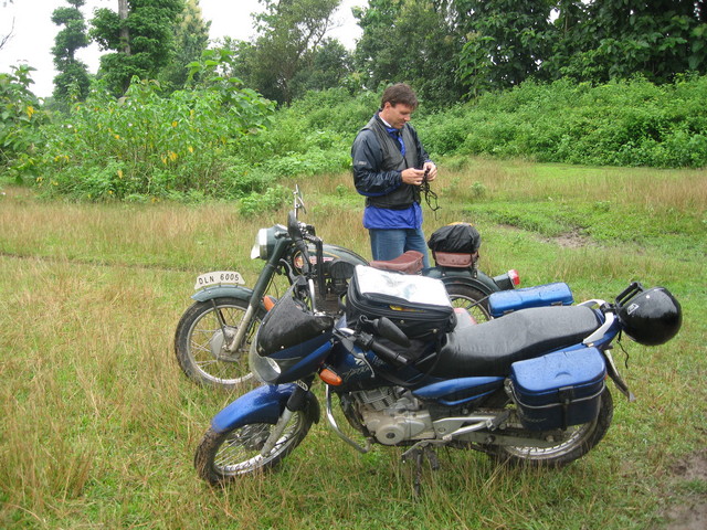 Scott with the bikes, where the road ends and the path begins