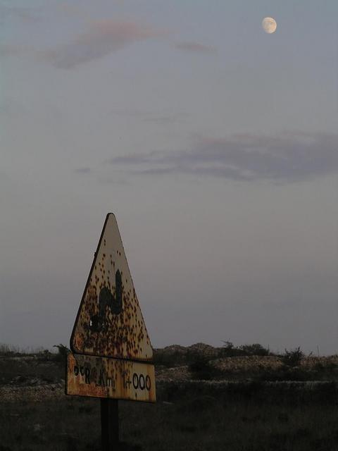 The famous roadsign about 150 metres east of the Confluence