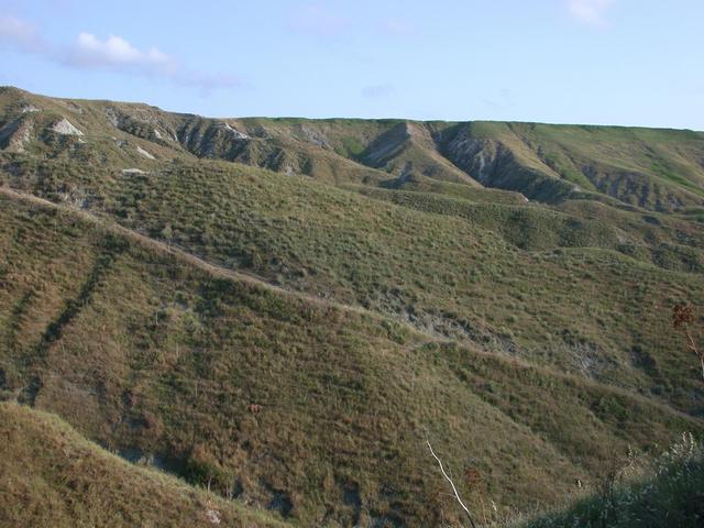Looking south, seeing the rugged hills at the end of the plateau.