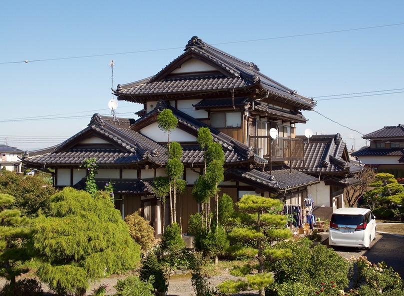 A modern home (with a roof that reflects traditional Japanese design) seen en route to the point