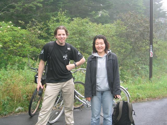 Parked our bikes to begin the short hike (me left, Akiko right)