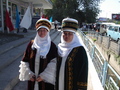 #7: two kyrgysz women in traditionell dress attending the event