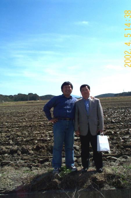 Me and my dad (on the right) on the confluence point.