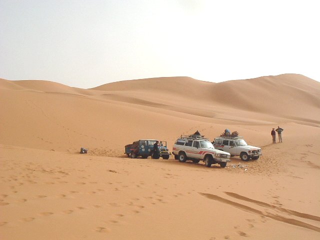 Breaking camp in dunes at 24°54'N 10°56'E
