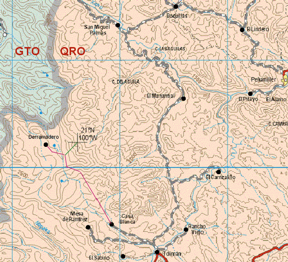 Topo map. Pink line: approximate route of dirt road. Green line: walking route