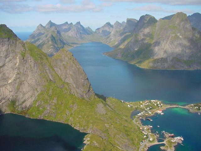 View from the ridge above Reine. The confluence is located in the saddle point above the end of Kjerkfjorden.