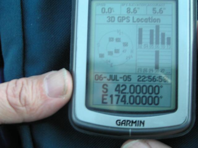 GPS unit at confluence.  Note that my GPS is set for North America mountain time, 1 day earlier and 6 hours "later."  Local time is 4:56pm (16:56) on 7 July 2005.
