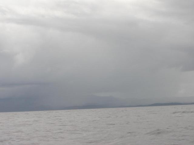 View South, with bits of Panay Island visible through rain and haze