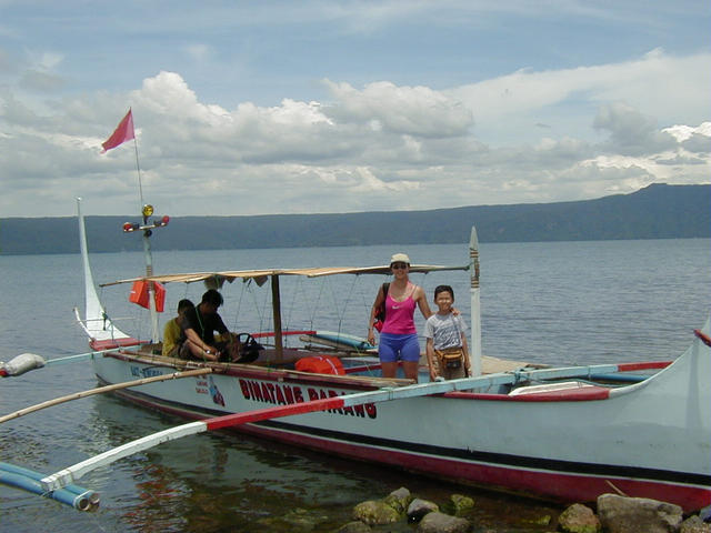 Olma and Kristoff on the banca before our swim. This is a stylized lake version of the typical "outrigger" type boat. Larger and more rugged ocean versions are used throughout the Philippine’s 7,000 islands.