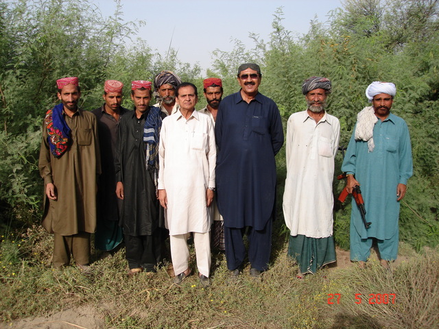 Mr Bijarani and Mr Kasim with guards and locals at confluence point