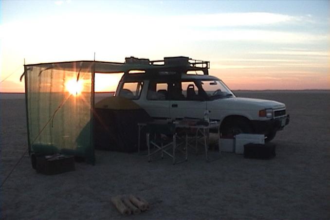 23N 52E, Sunset on camp.