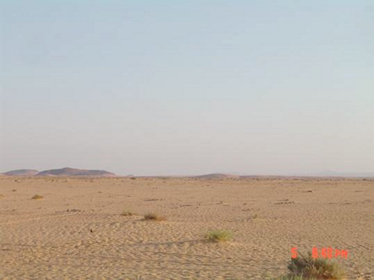 South view, where al-Khurayyimāt mountains can be seen.