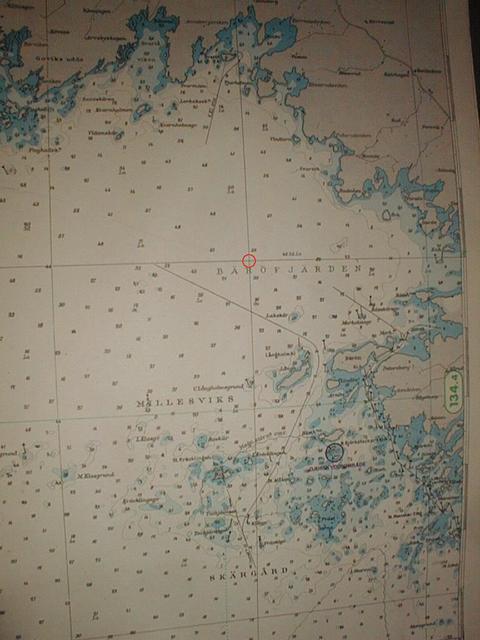 Part of a nautical chart for the area, the confluence is marked with a red ring