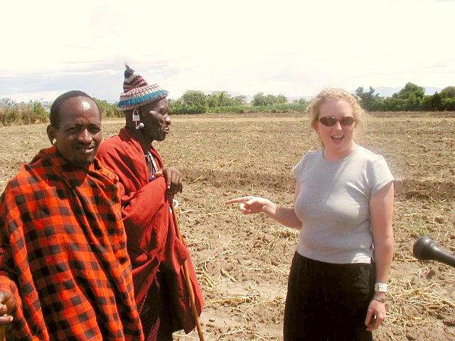 Sara discussing the merits of confluence finding with an Mzee from the village