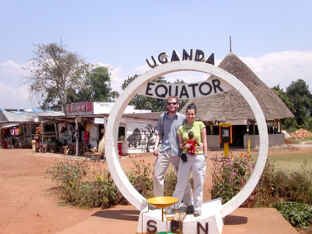 Laurel and Brian crossing the equator on the main road from Kampala (note funnel in foreground).