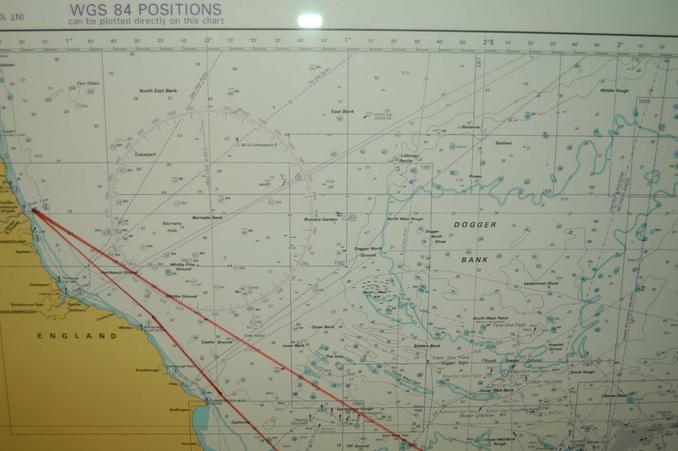 sea chart displayed onboard the ferry, red lines showing the ferry´s route