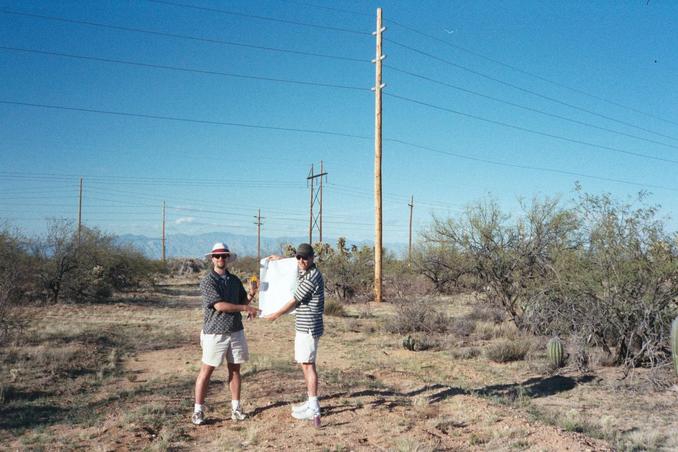 Paul and Andy with the map under the power lines.