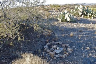 #1: The confluence point lies in rocky desert terrain (a rock circle left by previous visitors marks the point)