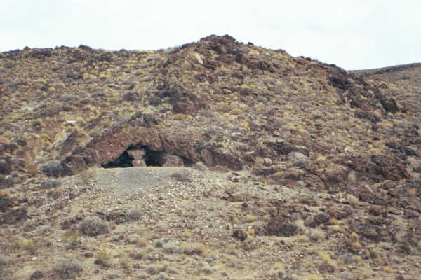 A strange-looking cave (or perhaps an old mine shaft?) visible near the confluence point