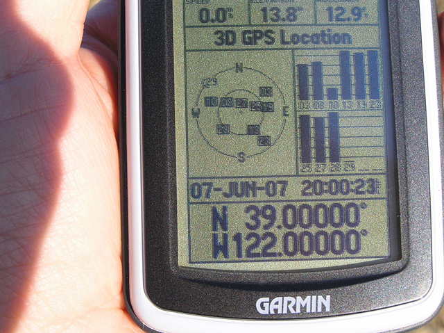 GPS reading at the confluence.  The GPS time is set for 1 hour later than the local time.