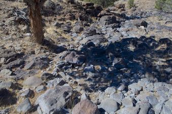 #1: The confluence point lies within a rocky creek bed - currently dry