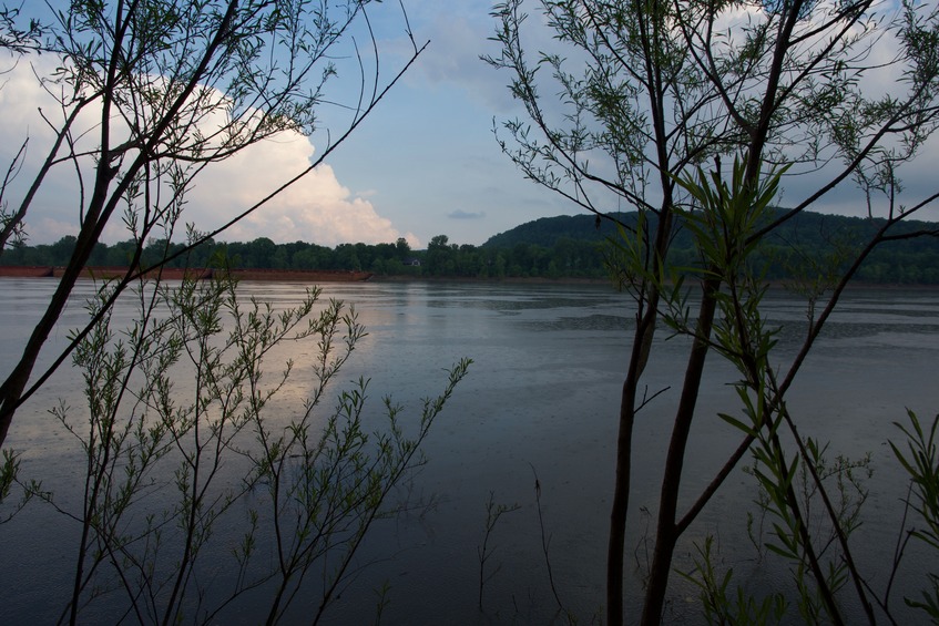 The confluence point lies 79 feet away, in the Ohio River.  (This is also a view to the South, towards Kentucky)