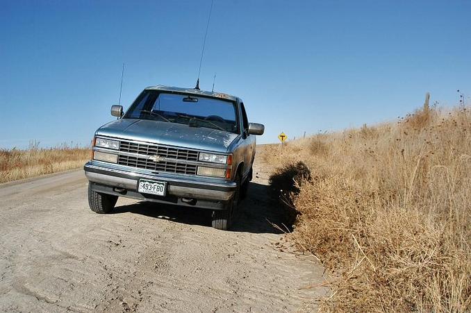 Picture of my truck zero'ing, with the state-line road "T" sign behind it