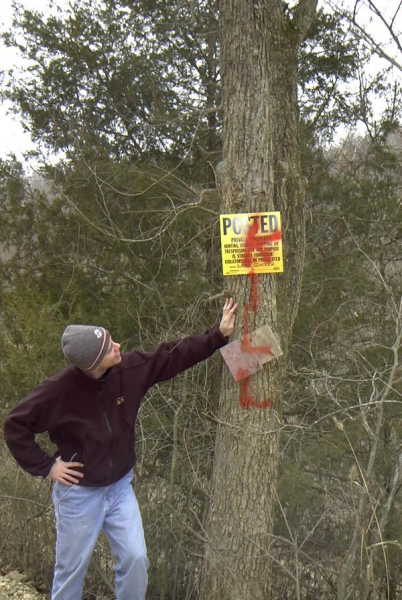 Kill signs, tresspassers beware!  Property owner is named "Land Owner."
