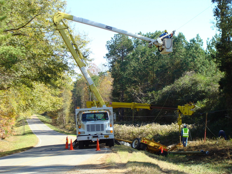 East Mississippi Electric Power Association crew prepares to install new utility pole.
