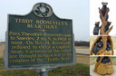 #9: Historic marker at the Onward Store still tells “Teddy Bear” story, while newly carved bears can be found in the nearby town of Rolling Fork, MS.