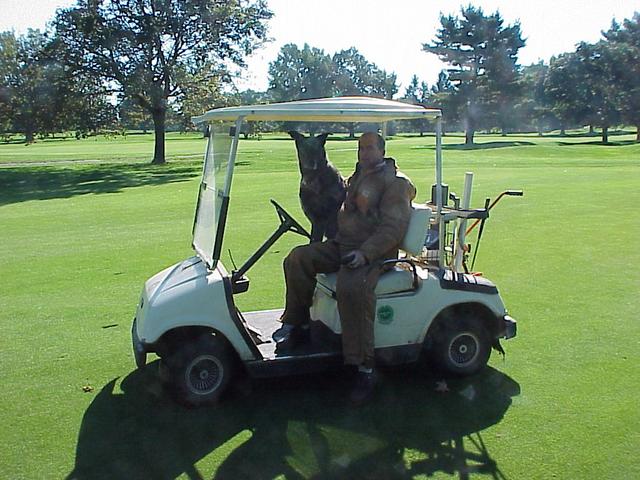 Doug Davis, Riverton Country Club greenkeeper, and golf course dog, in a view looking to the east from the confluence.