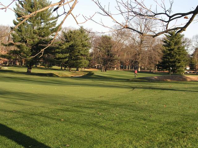 Grounds crew works on 4th green, north of 40N 75W
