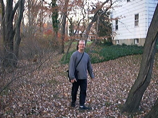 Emerging into the lot of a charming suburban home.